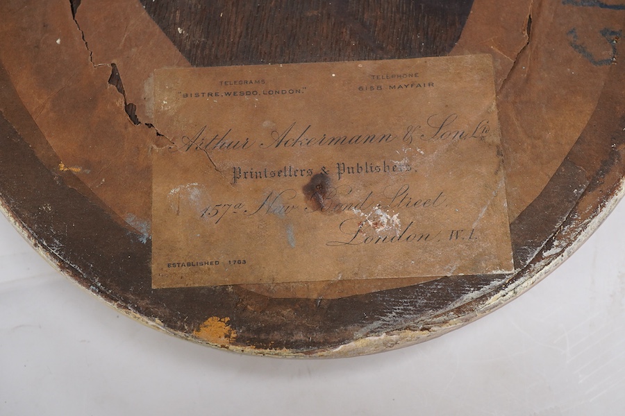 Attributed to John James Masquerier (1778-1855), portrait of a young girl holding a tabby cat, Arthur Ackermann label and ink inscription verso, oval oil, 15.5 x 12.5cm